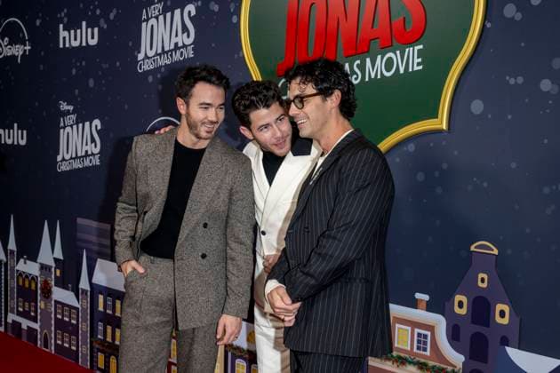 November 10, 2025, New York, United States: (L-R) Kevin Jonas, Nick Jonas and Joe Jonas attend Disney+ s A Very Jonas Christmas Movie New York Premiere at New York City Center. New York United States - ZUMAs197 20251110_aaa_s197_411 Copyright: xRonxAdarx