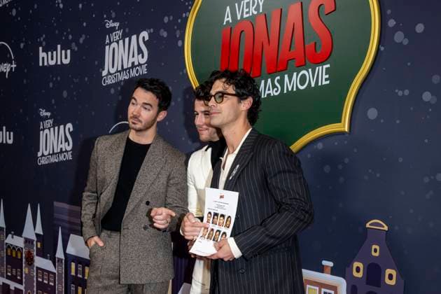 November 10, 2025, New York, United States: (L-R) Kevin Jonas, Nick Jonas and Joe Jonas attend Disney+ s A Very Jonas Christmas Movie New York Premiere at New York City Center. New York United States - ZUMAs197 20251110_aaa_s197_427 Copyright: xRonxAdarx