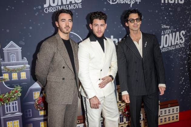 November 10, 2025, New York, United States: (L-R) Kevin Jonas, Nick Jonas and Joe Jonas attend Disney+ s A Very Jonas Christmas Movie New York Premiere at New York City Center. New York United States - ZUMAs197 20251110_aaa_s197_432 Copyright: xRonxAdarx