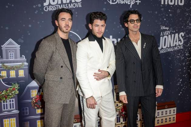 November 10, 2025, New York, United States: (L-R) Kevin Jonas, Nick Jonas and Joe Jonas attend Disney+ s A Very Jonas Christmas Movie New York Premiere at New York City Center. New York United States - ZUMAs197 20251110_aaa_s197_434 Copyright: xRonxAdarx
