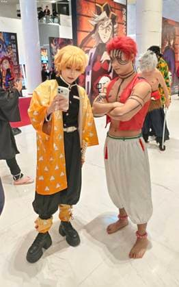 Demon Slayer Kimetsu no Yaiba - The Movie: Infinity Castle China Premiere Ceremony SHANGHAI, CHINA - NOVEMBER 10, 2025 - Demon Slayer Kimetsu no Yaiba - The Movie: Infinity Castle China Premiere Ceremony, fan cosplay takes a photo in front of the poster wall as an anime character, Shanghai, China on November 10, 2025. Shanghai Shanghai China  Copyright: xCFOTOx i1762873154331