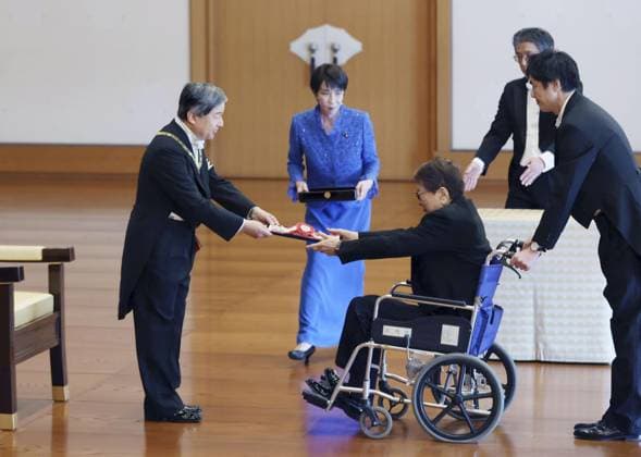 Imperial conferment of decorations Taku Yamamoto (3rd from L), a former House of Representatives lawmaker, is conferred the Grand Cordon of the Order of the Rising Sun from Japan s Emperor Naruhito during a ceremony at the Imperial Palace in Tokyo on Nov. 11, 2025. The honoree, whose real surname is Takaichi, is the husband of Japanese Prime Minister Sanae Takaichi (2nd from L). (Pool photo)  A14AA0005027104P