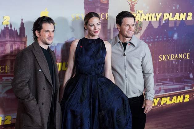 November 11, 2025, London, England, United Kingdom: (L-R) KIT HARINGTON, MICHELLE MONAGHAN and MARK WAHLBERG attend the World Premiere of The Family Plan 2 at Curzon Mayfair in London. London United Kingdom - ZUMAs371 20251111_zip_s371_074 Copyright: xWiktorxSzymanowiczx