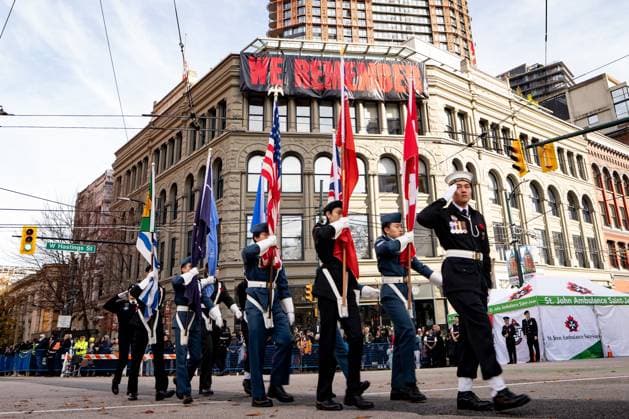 November 11, 2025, Vancouver, Bc, CANADA: Flagbearers pass the Victory Square Cenotaph during a Remembrance Day ceremony, in Vancouver, B.C., Tuesday, Nov. 11, 2025. Vancouver CANADA  - ZUMAc35_ 20251111_zaf_c35_239 Copyright: xEthanxCairnsx