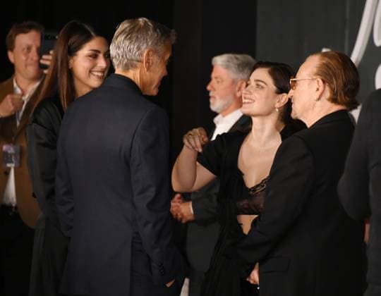 LOS ANGELES, CA- NOVEMBER 11: George Clooney, Eve Hewson and Bono at the Los Angeles premiere of Netflix s Jay Kelly at The Egyptian Theatre Hollywood on November 11, 2025 in Los Angeles, California. Copyright: xJeffreyxMayerx