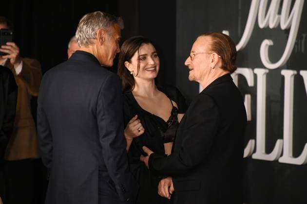 LOS ANGELES, CA- NOVEMBER 11: George Clooney, Eve Hewson and Bono at the Los Angeles premiere of Netflix s Jay Kelly at The Egyptian Theatre Hollywood on November 11, 2025 in Los Angeles, California. Copyright: xJeffreyxMayerx