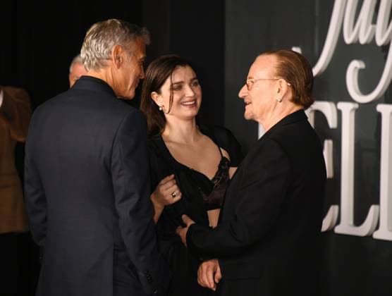 LOS ANGELES, CA- NOVEMBER 11: George Clooney, Eve Hewson and Bono at the Los Angeles premiere of Netflix s Jay Kelly at The Egyptian Theatre Hollywood on November 11, 2025 in Los Angeles, California. Copyright: xJeffreyxMayerx