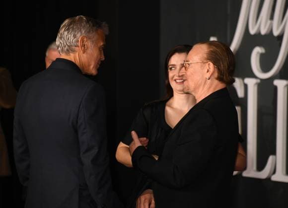 LOS ANGELES, CA- NOVEMBER 11: George Clooney, Eve Hewson and Bono at the Los Angeles premiere of Netflix s Jay Kelly at The Egyptian Theatre Hollywood on November 11, 2025 in Los Angeles, California. Copyright: xJeffreyxMayerx