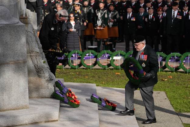 (251111) -- VANCOUVER, Nov. 11, 2025 -- A World War II veteran places a wreath at the Victory Square Cenotaph during a Remembrance Day ceremony in Vancouver, British Columbia, Canada, Nov. 11, 2025. (Photo by Liang Sen Xinhua) CANADA-VANCOUVER-REMEMBRANCE DAY LinxWei 