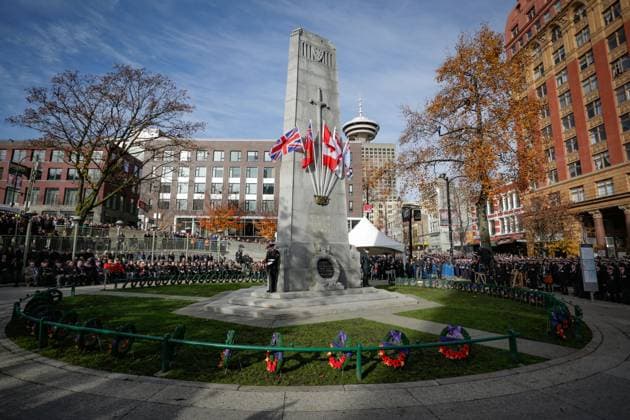 (251111) -- VANCOUVER, Nov. 11, 2025 -- A Remembrance Day ceremony is held at the Victory Square Cenotaph in Vancouver, British Columbia, Canada, Nov. 11, 2025. (Photo by Liang Sen Xinhua) CANADA-VANCOUVER-REMEMBRANCE DAY LinxWei 