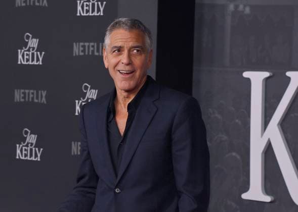 Cast member George Clooney attends the premiere of Netflix s dramatic comedy Jay Kelly at the Egyptian Theatre in the Hollywood section of Los Angeles on Tuesday, November 11, 2025. Storyline: Famous movie actor Jay Kelly embarks on a journey of self-discovery, confronting his past and present with his devoted manager Ron. Poignant and humor-filled, pitched at the intersection of regrets and glories.  LAP2025111103 JIMxRUYMEN