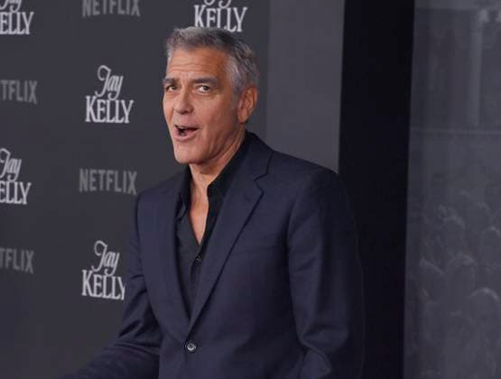 Cast member George Clooney attends the premiere of Netflix s dramatic comedy Jay Kelly at the Egyptian Theatre in the Hollywood section of Los Angeles on Tuesday, November 11, 2025. Storyline: Famous movie actor Jay Kelly embarks on a journey of self-discovery, confronting his past and present with his devoted manager Ron. Poignant and humor-filled, pitched at the intersection of regrets and glories.  LAP2025111104 JIMxRUYMEN