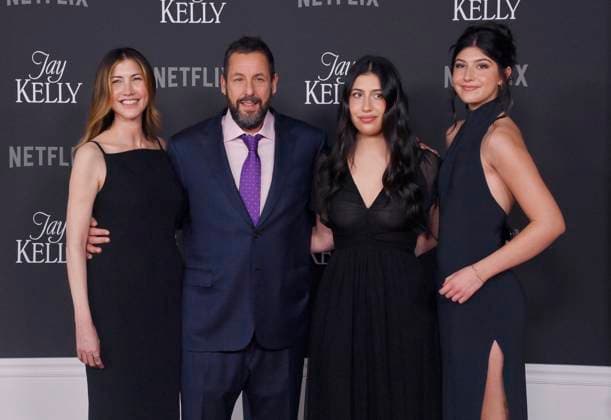 Cast member Adam Sandler (2nd-L) and his wife Jackie Sandler, and their daughters Sadie Sandler and Sunny Sandler (L-R) attend the premiere of Netflix s dramatic comedy Jay Kelly at the Egyptian Theatre in the Hollywood section of Los Angeles on Tuesday, November 11, 2025. Storyline: Famous movie actor Jay Kelly embarks on a journey of self-discovery, confronting his past and present with his devoted manager Ron. Poignant and humor-filled, pitched at the intersection of regrets and glories.  LAP2025111111 JIMxRUYMEN