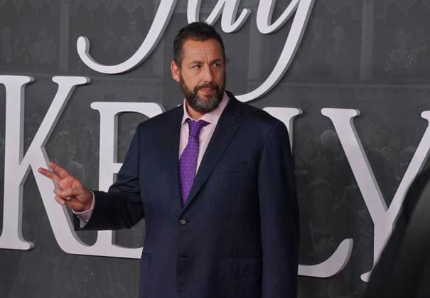 Cast member Adam Sandler attends the premiere of Netflix s dramatic comedy Jay Kelly at the Egyptian Theatre in the Hollywood section of Los Angeles on Tuesday, November 11, 2025. Storyline: Famous movie actor Jay Kelly embarks on a journey of self-discovery, confronting his past and present with his devoted manager Ron. Poignant and humor-filled, pitched at the intersection of regrets and glories.  LAP2025111112 JIMxRUYMEN
