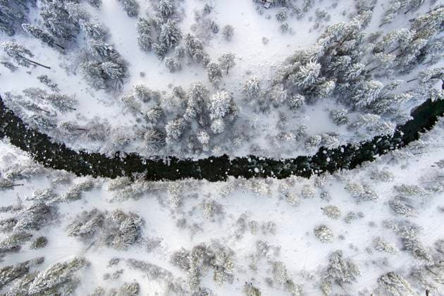 Aerial view of a snow covered winter landscape at dawn Peshastin, Washington, United States R_CIRF251110A-1889563-01