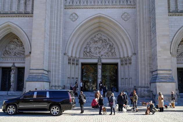 Attendees, including several dogs, stand outside of the celebration of life ceremony for Dr. Jane Goodall, DBE at the Washington National Cathedral on Wednesday, November 12, 2025 in Washington, DC.  WAP20251112903 LeighxVogel