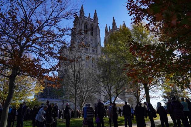 Attendees stand in line to enter the celebration of life ceremony for Dr. Jane Goodall, DBE at the National Cathedral on Wednesday, November 12, 2025 in Washington, DC.  WAP20251112202 LeighxVogel