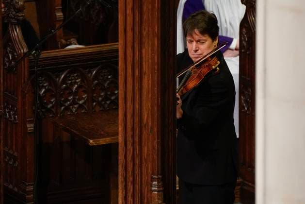 Joshua Bell plays the violin during a tribute to Dr. Jane Goodall, DBE during a celebration and thanksgiving for life event at the Washington National Cathedral on Wednesday, November 12, 2025 in Washington DC.  WAP20251112929 LeighxVogel