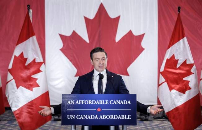 November 12, 2025, Calgary, Ab, CANADA: Conservative leader Pierre Poilievre gestures as he speaks at a news conference in Calgary, on Wednesday, Nov. 12, 2025. Calgary CANADA  - ZUMAc35_ 20251112_zaf_c35_057 Copyright: xJeffxMcintoshx