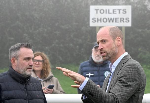 The Prince Of Wales Opens New Road At Mousehole Football Club Prince William, Prince of Wales, Duke of Cornwall (L) speaks with members of the community during his visit to Mousehole AFC, where he opened a new access road to the club s ground and facilities on November 13, 2025 in Mousehole, England., Credit:Avalon.red Avalon United Kingdom, England, Mousehole  Copyright: xAvalon.redx xAvalonx 1052257798