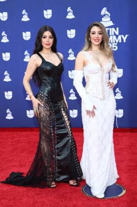 (L-R) Mariel Santos and Marian Santos of Marian y Mariel arrive for the 26th annual Latin Grammy Awards at the MGM Garden Arena in Las Vegas, Nevada on Thursday, November 13, 2025.  LAV20251113111 JAMESxATOA