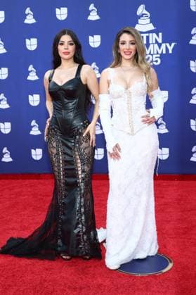 (L-R) Mariel Santos and Marian Santos of Marian y Mariel arrive for the 26th annual Latin Grammy Awards at the MGM Garden Arena in Las Vegas, Nevada on Thursday, November 13, 2025.  LAV20251113112 JAMESxATOA