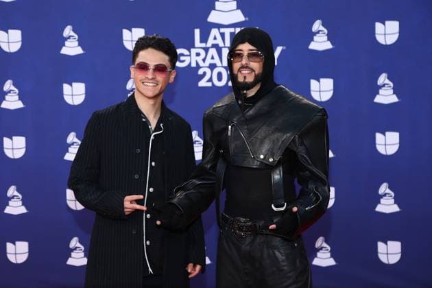 Yandel (R) arrives for the 26th annual Latin Grammy Awards at the MGM Garden Arena in Las Vegas, Nevada on Thursday, November 13, 2025.  LAV20251113135 JAMESxATOA