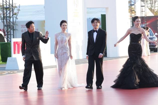 XIAMEN, CHINA - NOVEMBER 15: Hosts of the 38th China Golden Rooster Awards, (L-R) actor Deng Chao, hostess Lan Yu, actor singer Alec Su You-peng and actress Ni Ni arrive at the red carpet for the closing ceremony during the 38th China Golden Rooster Awards on November 15, 2025 in Xiamen, Fujian Province of China.  Copyright: xVCGx 111604061014
