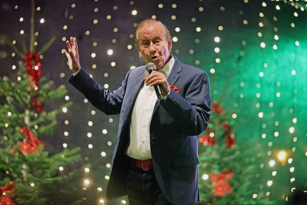 German music legends Born on July 29, 1943, Lothar Bernhard Walter, who achieved great success as a pop singer and film actor under his stage name Michael Holm, sings on a stage in Essen Steele at the local Christmas market in the run-up to Christmas Essen North Rhine-Westphalia Germany Steele