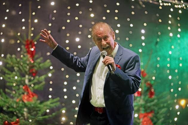 German music legends Born on July 29, 1943, Lothar Bernhard Walter, who achieved great success as a pop singer and film actor under his stage name Michael Holm, sings on a stage in Essen Steele at the local Christmas market in the run-up to Christmas Essen North Rhine-Westphalia Germany Steele