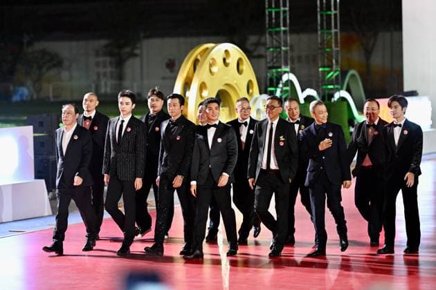 XIAMEN, CHINA - NOVEMBER 15: The cast and crew of Penghu Hai Zhan arrive at the red carpet for the closing ceremony during the 38th China Golden Rooster Awards on November 15, 2025 in Xiamen, Fujian Province of China.  Copyright: xChinaxNewsxServicex 111604092422