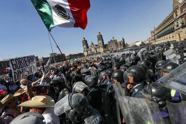 Gen Z Protest Against Mexico s Government People confront riot police during the ˜Gen Z™ demonstration at main square Zocalo against the Mexican government following the murder of Uruapan Mayor Carlos Manzola, while Mexico s President, Claudia Sheinbaum, has questioned the legitimacy of the movement in recent days . on November 15, 2025 in Mexico City, Mexico. (Photo by Ian Robles Eyepix Group) Copyright: xIanxRoblesx xEyepixxGroupx EL_15112025_173193JPEG
