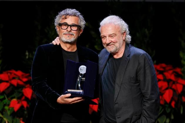 22nd Monte Carlo Film Festival - Awards Gala Night Paolo Genovese receives the Career Award from Giovanni Veronesi and Ezio Greggio the awards gala night held at Grimaldi Forum during 22nd Monte Carlo Film Festival on November 15, 2025 in Monte Carlo, Monaco. Photo Marco Piovanotto ABACAPRESS.COM Monte Carlo Monaco  Copyright: xPiovanottoxMarco ABACAx