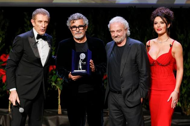 22nd Monte Carlo Film Festival - Awards Gala Night Paolo Genovese receives the Career Award from Giovanni Veronesi and Ezio Greggio the awards gala night held at Grimaldi Forum during 22nd Monte Carlo Film Festival on November 15, 2025 in Monte Carlo, Monaco. Photo Marco Piovanotto ABACAPRESS.COM Monte Carlo Monaco  Copyright: xPiovanottoxMarco ABACAx