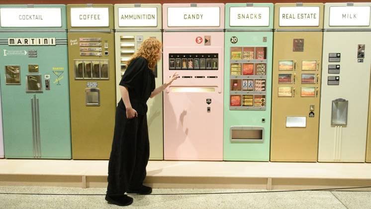Wes Anderson: The Archives Press Preview at Design Museum, London, UK A staff member views A bank of Vending Machines created for Asteroid City by Atelier Simon Weisse and Erica Dorn (2021) at a photocall for The Design Museum s Wes Anderson: The Archives Exhibition at The Design Museum in London, England, UK on Monday 17 November 2025. The exhibition runs from 21 November 2025 - 26 July 2026., Credit:Justin Ng Avalon UK, England, London, Design Museum  Copyright: xJustinxNgx xAvalonx 1052941817