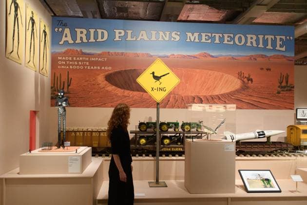 Wes Anderson: The Archives Press Preview at Design Museum, London, UK A staff member views Props created for Asteroid City at a photocall for The Design Museum s Wes Anderson: The Archives Exhibition at The Design Museum in London, England, UK on Monday 17 November 2025. The exhibition runs from 21 November 2025 - 26 July 2026., Credit:Justin Ng Avalon UK, England, London, Design Museum  Copyright: xJustinxNgx xAvalonx 1052941845