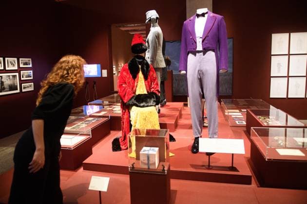 Wes Anderson: The Archives Press Preview at Design Museum, London, UK A staff member views Costumes from The Grand Budapest Hotel including a Monsieur Gustave Concierge Uniform worn by Ralph Fiennes, Agatha Costume worn by Saoirse Ronan at a photocall for The Design Museum s Wes Anderson: The Archives Exhibition at The Design Museum in London, England, UK on Monday 17 November 2025. The exhibition runs from 21 November 2025 - 26 July 2026., Credit:Justin Ng Avalon UK, England, London, Design Museum  Copyright: xJustinxNgx xAvalonx 1052941908