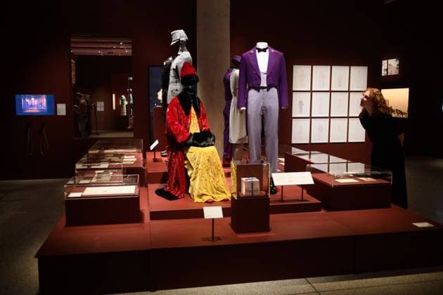 Wes Anderson: The Archives Press Preview at Design Museum, London, UK A staff member views Costumes from The Grand Budapest Hotel including a Monsieur Gustave Concierge Uniform worn by Ralph Fiennes, Agatha Costume worn by Saoirse Ronan at a photocall for The Design Museum s Wes Anderson: The Archives Exhibition at The Design Museum in London, England, UK on Monday 17 November 2025. The exhibition runs from 21 November 2025 - 26 July 2026., Credit:Justin Ng Avalon UK, England, London, Design Museum  Copyright: xJustinxNgx xAvalonx 1052941912