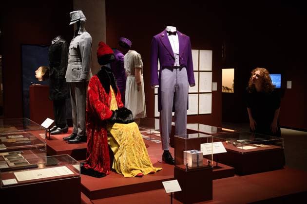 Wes Anderson: The Archives Press Preview at Design Museum, London, UK A staff member views Costumes from The Grand Budapest Hotel including a Monsieur Gustave Concierge Uniform worn by Ralph Fiennes, Agatha Costume worn by Saoirse Ronan at a photocall for The Design Museum s Wes Anderson: The Archives Exhibition at The Design Museum in London, England, UK on Monday 17 November 2025. The exhibition runs from 21 November 2025 - 26 July 2026., Credit:Justin Ng Avalon UK, England, London, Design Museum  Copyright: xJustinxNgx xAvalonx 1052941915