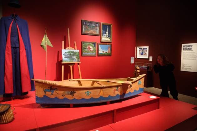 Wes Anderson: The Archives Press Preview at Design Museum, London, UK A staff member views Props from Moonrise Kingdom including khaki scout troop 55 canoe, oar and flag stolen by Sam for his escape from Camp at a photocall for The Design Museum s Wes Anderson: The Archives Exhibition at The Design Museum in London, England, UK on Monday 17 November 2025. The exhibition runs from 21 November 2025 - 26 July 2026., Credit:Justin Ng Avalon UK, England, London, Design Museum  Copyright: xJustinxNgx xAvalonx 1052941919