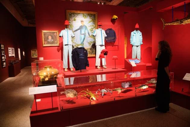 Wes Anderson: The Archives Press Preview at Design Museum, London, UK A staff member views Team Zissou s uniforms designed by Milena Canonero for The Life Aquatic with Steve Zissou at a photocall for The Design Museum s Wes Anderson: The Archives Exhibition at The Design Museum in London, England, UK on Monday 17 November 2025. The exhibition runs from 21 November 2025 - 26 July 2026., Credit:Justin Ng Avalon UK, England, London, Design Museum  Copyright: xJustinxNgx xAvalonx 1052941944