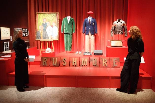 Wes Anderson: The Archives Press Preview at Design Museum, London, UK A staff member views Max Fischer s wardrobe worn by Jason Schartzman and designed by Karen Patch for Rushmore at a photocall for The Design Museum s Wes Anderson: The Archives Exhibition at The Design Museum in London, England, UK on Monday 17 November 2025. The exhibition runs from 21 November 2025 - 26 July 2026., Credit:Justin Ng Avalon UK, England, London, Design Museum  Copyright: xJustinxNgx xAvalonx 1052941964