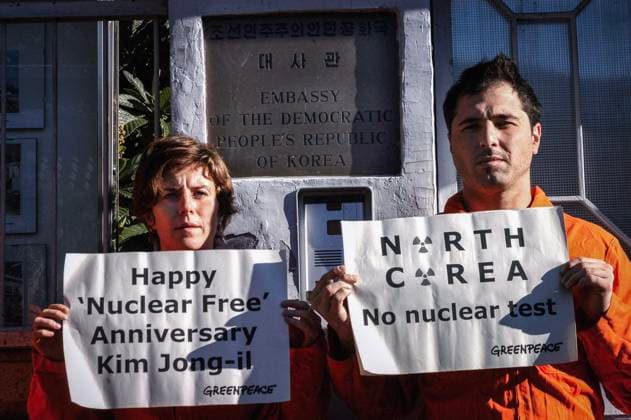North Korea: Happy Nuclear Free Anniversary Kim Jong-il ROME, ITALY - OCTOBER 8: Greenpeace demonstration in front of the North Korean Embassy to protest against nuclear testing and to deliver a letter of protest from Greenpeace to the North Korean Ambassador. North Korean leader Kim Jong-il is planning to test nuclear weapons in the coming days, coinciding with the 9th anniversary of his leadership of the country on October 8 th 2006 in Rome, Italy. Rome Lazio Italy Copyright: xStefanoxMontesix