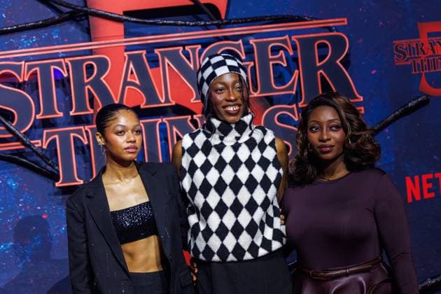 Stranger Things 5 fan event Maureen Adim, Toni Dreher Adenuga and Temi Dreher at the Netflix Stranger Things season 5 fan event at Tempelhof Airport Hangar 7 on 18 11 2025 in Berlin Copyright: xEventpressxKochanx
