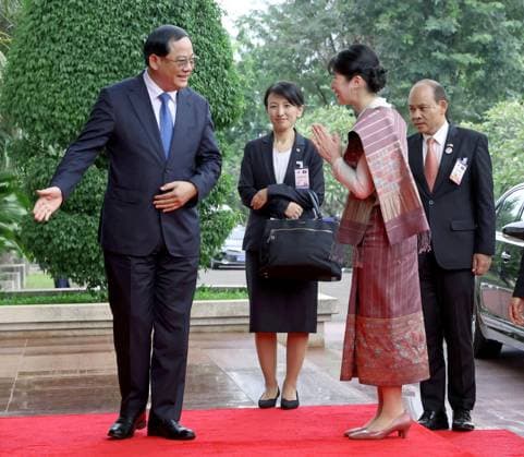 Japan Princess Aiko in Laos Japanese Princess Aiko (front, R) is greeted by Lao Prime Minister Sonexay Siphandone (front, L) upon arriving at the Lao prime minister s office in Vientiane on Nov. 18, 2025, during her official trip to Laos. (Pool photo)  A14AA0005044105P