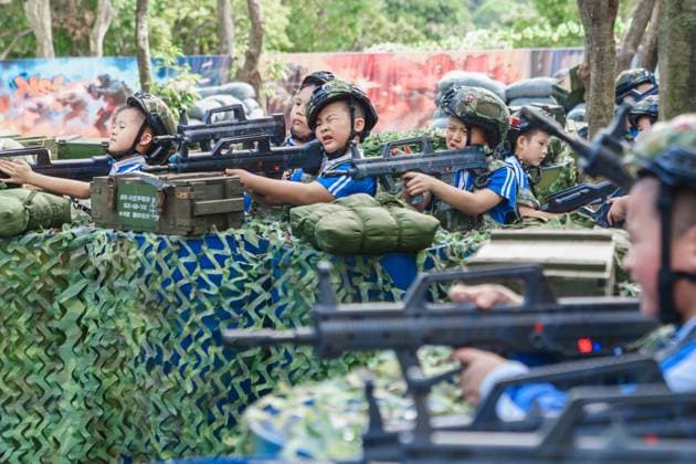 SHENZHEN, CHINA - OCTOBER 15: Kids play shooting games at the Shenzhen Yuanshan Scenic Area on October 15, 2025 in Longgang District, Shenzhen City, Guangdong Province of China.  Copyright: xVCGx 111604823390