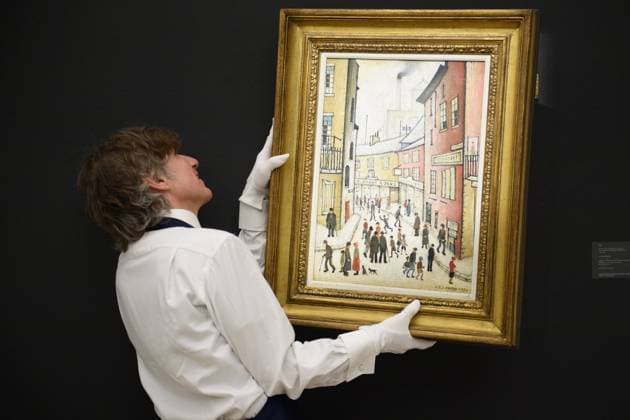 Sotheby s Modern British and Irish Art Evening Auction Sotheby s, London A technician holds up An Old Street by L.S. Lowry (Laurence Stephen Lowry) (est. Â£800k - Â£1.2m) and which is to go on auction at Sotheby s Modern British and Irish Art Evening Auction on 25th November 2025 at Sotheby s, London, England, UK on Wednesday 19 November, 2025., Credit:Justin Ng Avalon UK, England, London, Sotheby s  Copyright: xJustinxNgx xAvalonx 1053351355