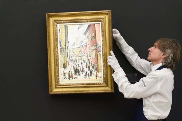 Sotheby s Modern British and Irish Art Evening Auction Sotheby s, London A technician holds up An Old Street by L.S. Lowry (Laurence Stephen Lowry) (est. Â£800k - Â£1.2m) and which is to go on auction at Sotheby s Modern British and Irish Art Evening Auction on 25th November 2025 at Sotheby s, London, England, UK on Wednesday 19 November, 2025., Credit:Justin Ng Avalon UK, England, London, Sotheby s  Copyright: xJustinxNgx xAvalonx 1053351358