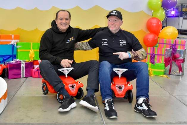 abb presenter Wolfram Kons and Joey Kelly musician athlete in the Bobbycar slide cars in the RTL studio at the photo session for the 24 hour charity birthday challenge 30th birthday of the RTL Spendenmarathon wir helfen Kindern bei RTL Deutschland on 19 11 2025 in Cologne Deutz NRW Germany