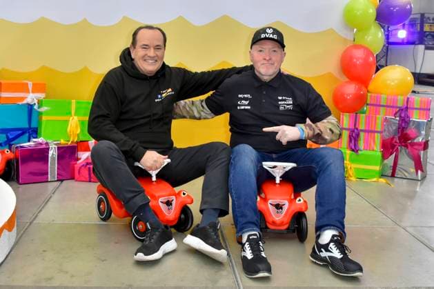 abb presenter Wolfram Kons and Joey Kelly musician athlete in the Bobbycar slide cars in the RTL studio at the photo session for the 24 hour charity birthday challenge 30th birthday of the RTL Spendenmarathon wir helfen Kindern bei RTL Deutschland on 19 11 2025 in Cologne Deutz NRW Germany